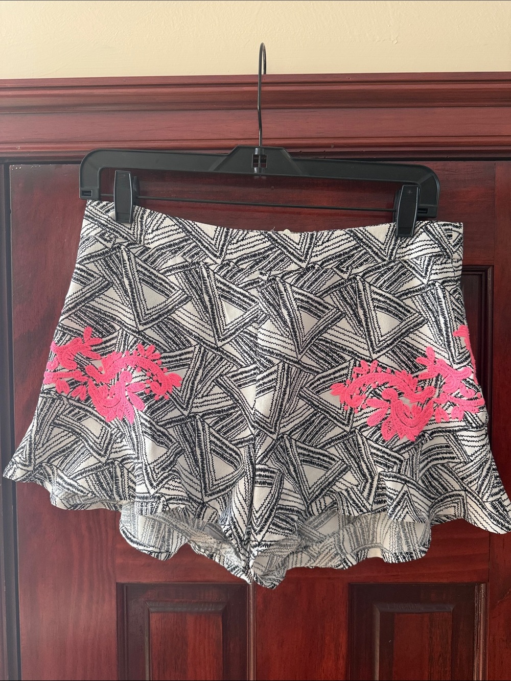 Black & White Geometric Flounce Shorts with Pink Floral Accent